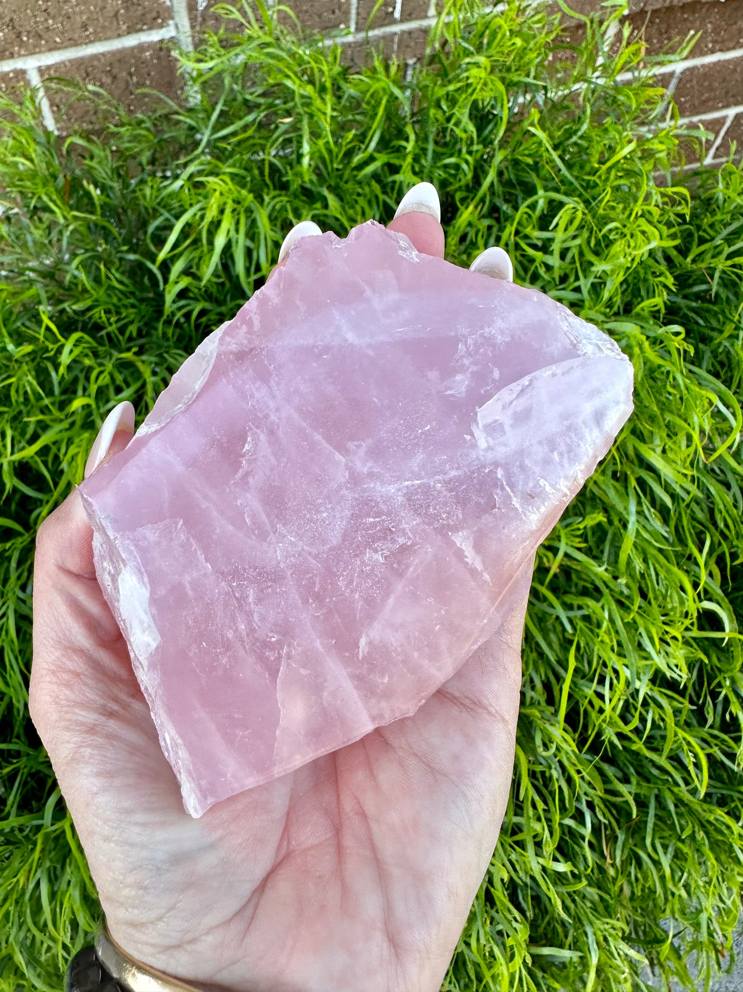 Half polished half raw rose quartz chunk