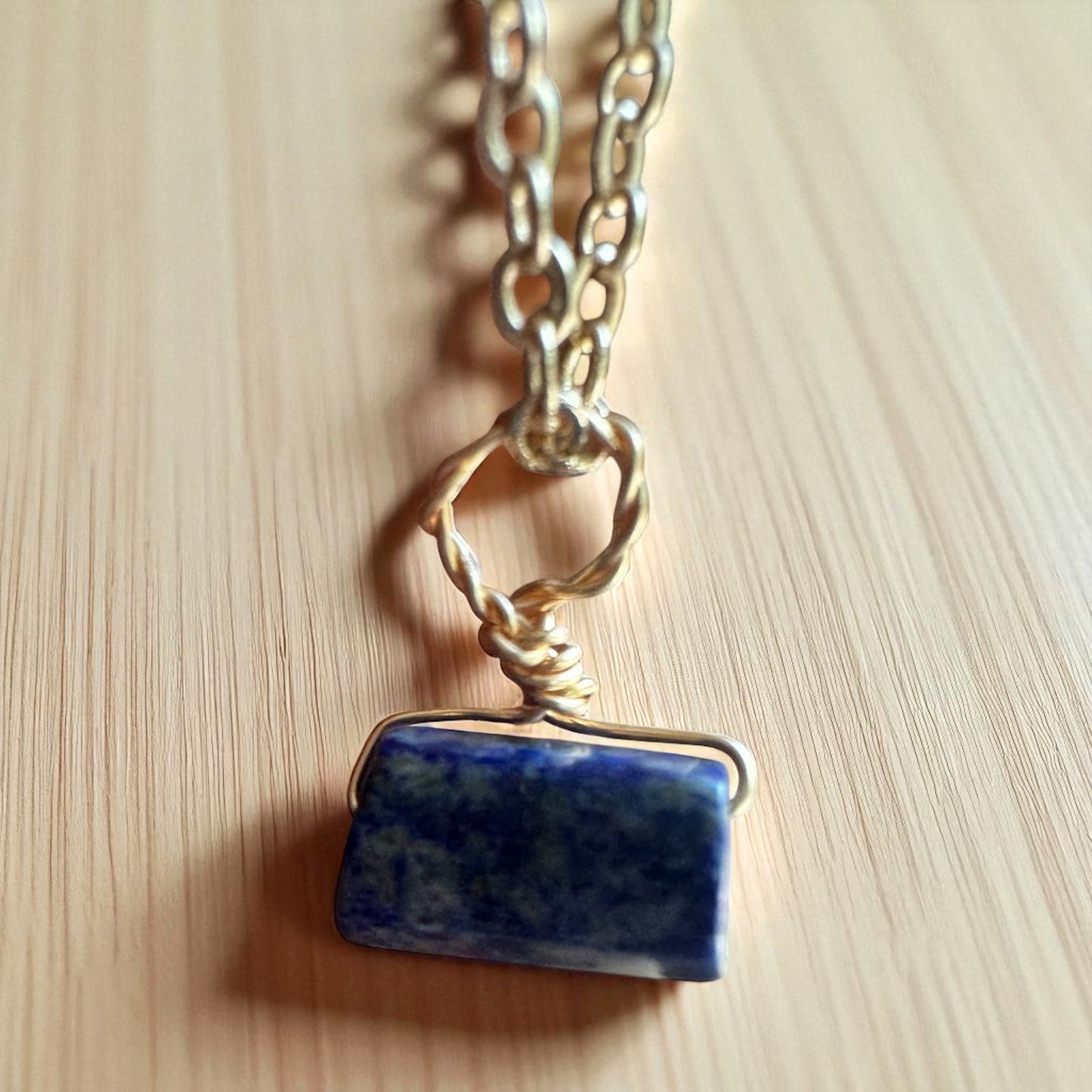 Gold lapis pendant