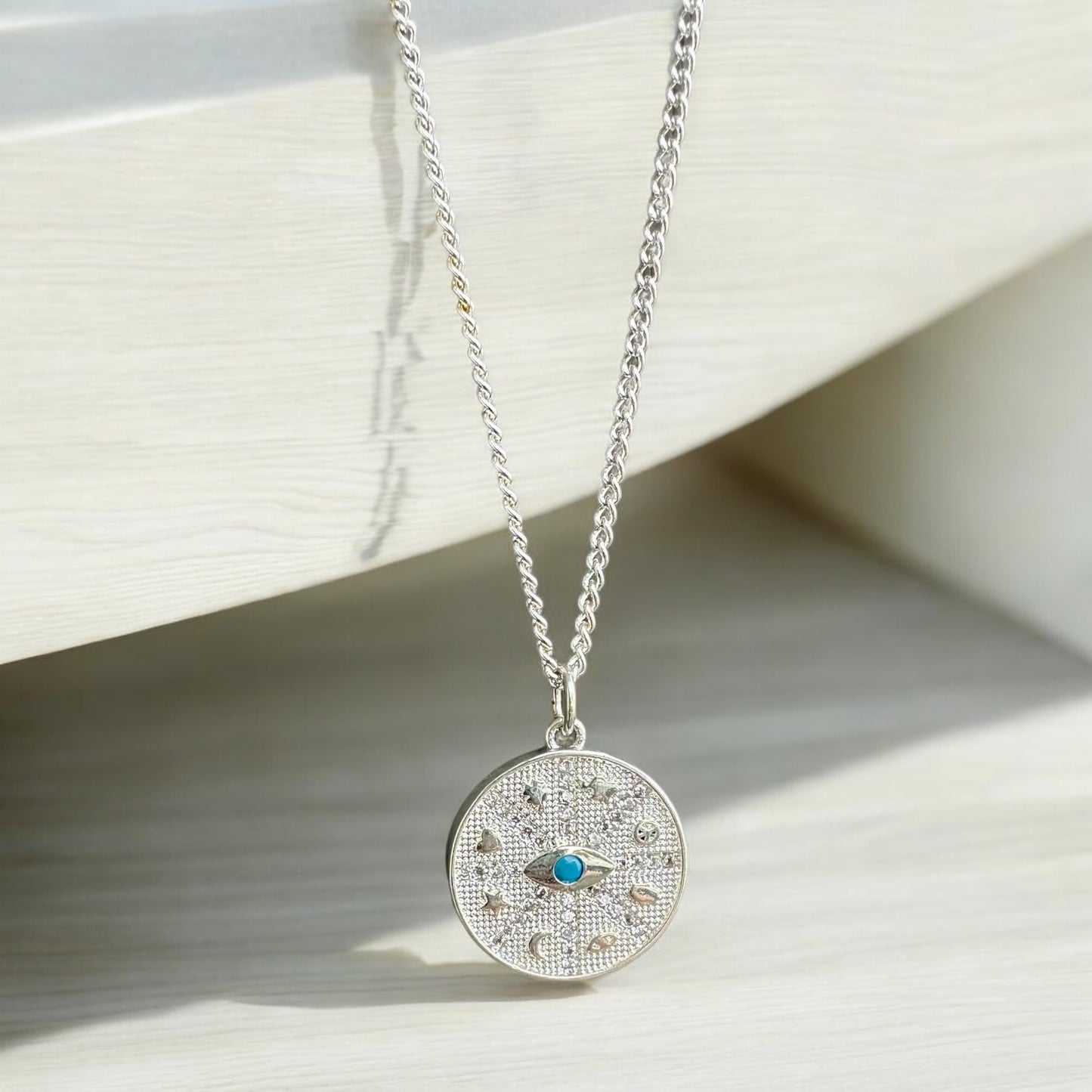 By TBOS - turquoise eye pendant