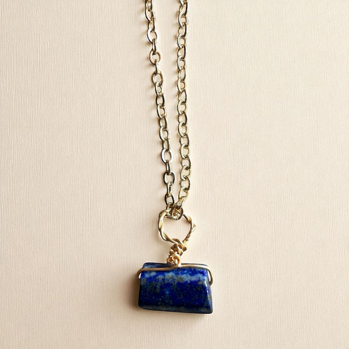 Gold lapis pendant