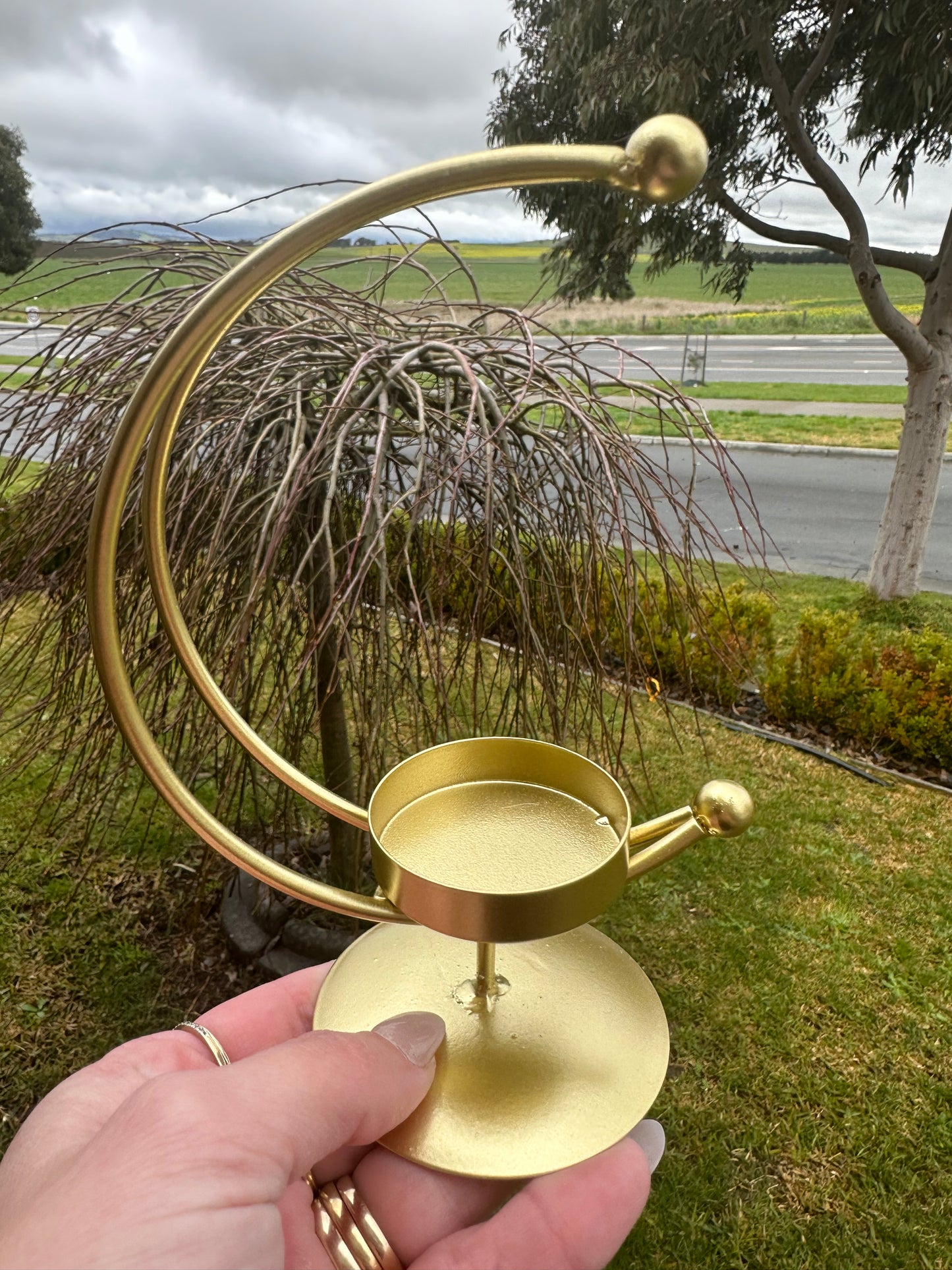 Golden moon candle holder