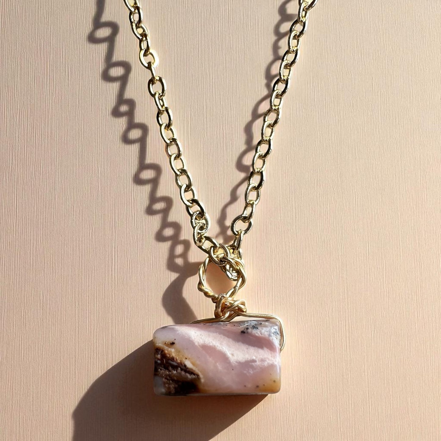 Gold pink opal pendant