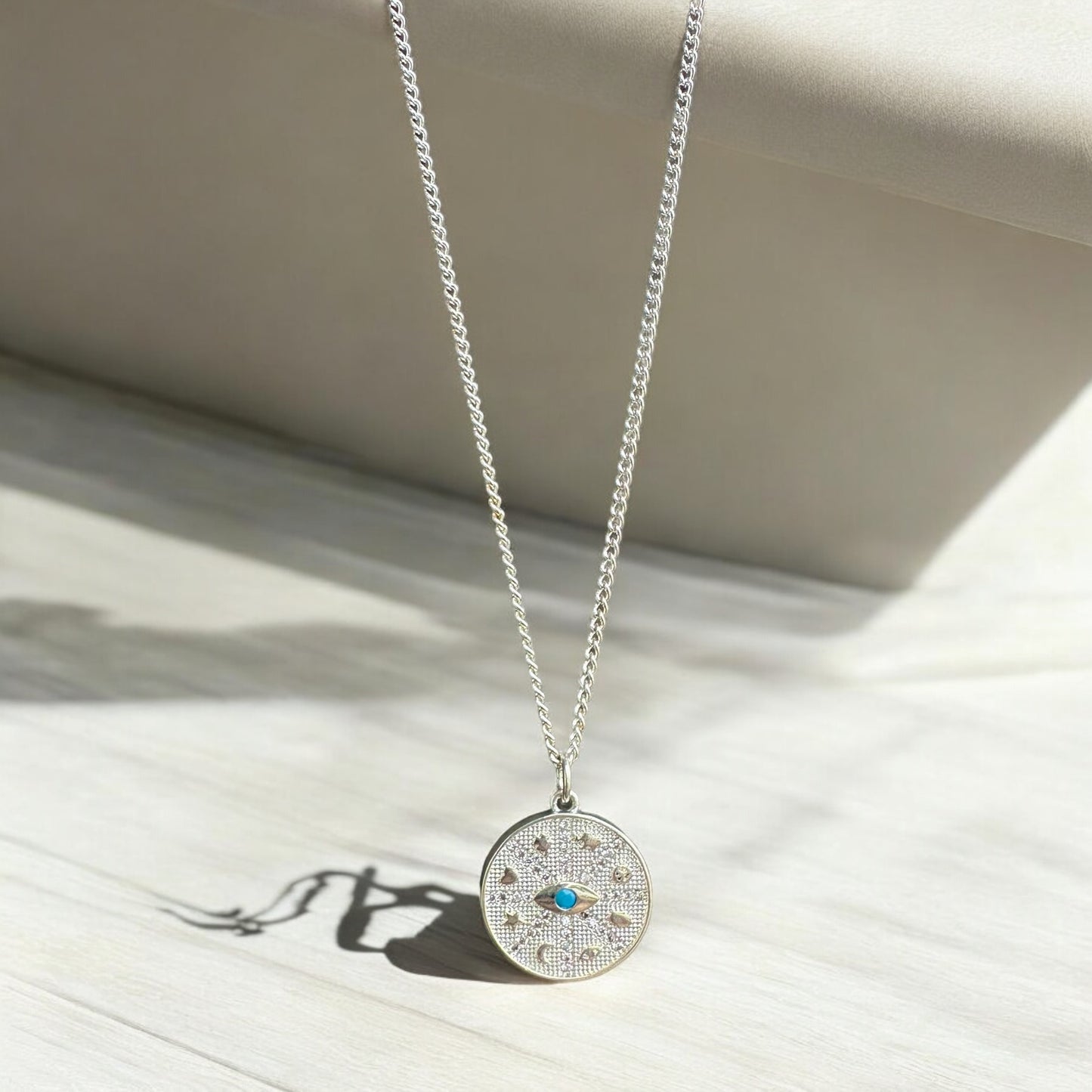 By TBOS - turquoise eye pendant
