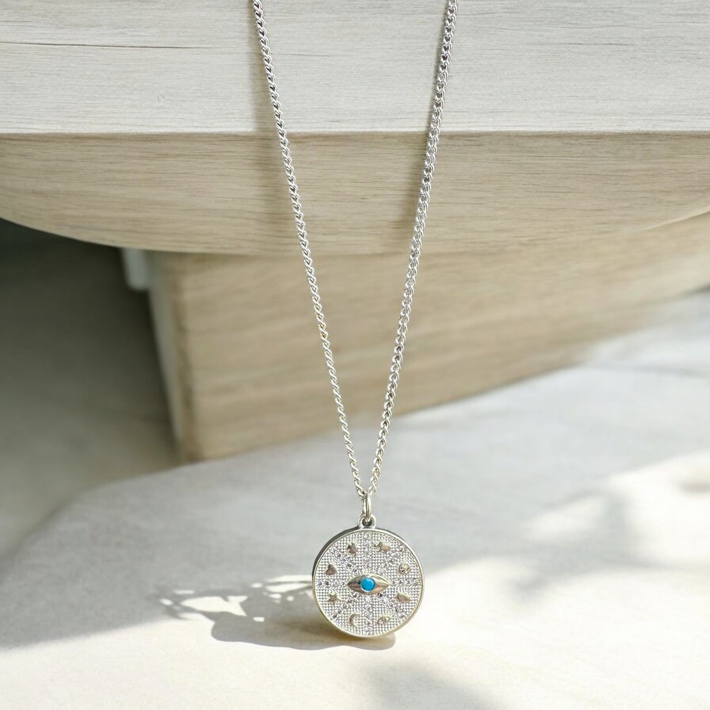 By TBOS - turquoise eye pendant