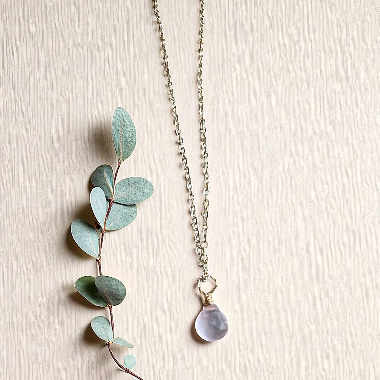 Gold rose quartz pendant
