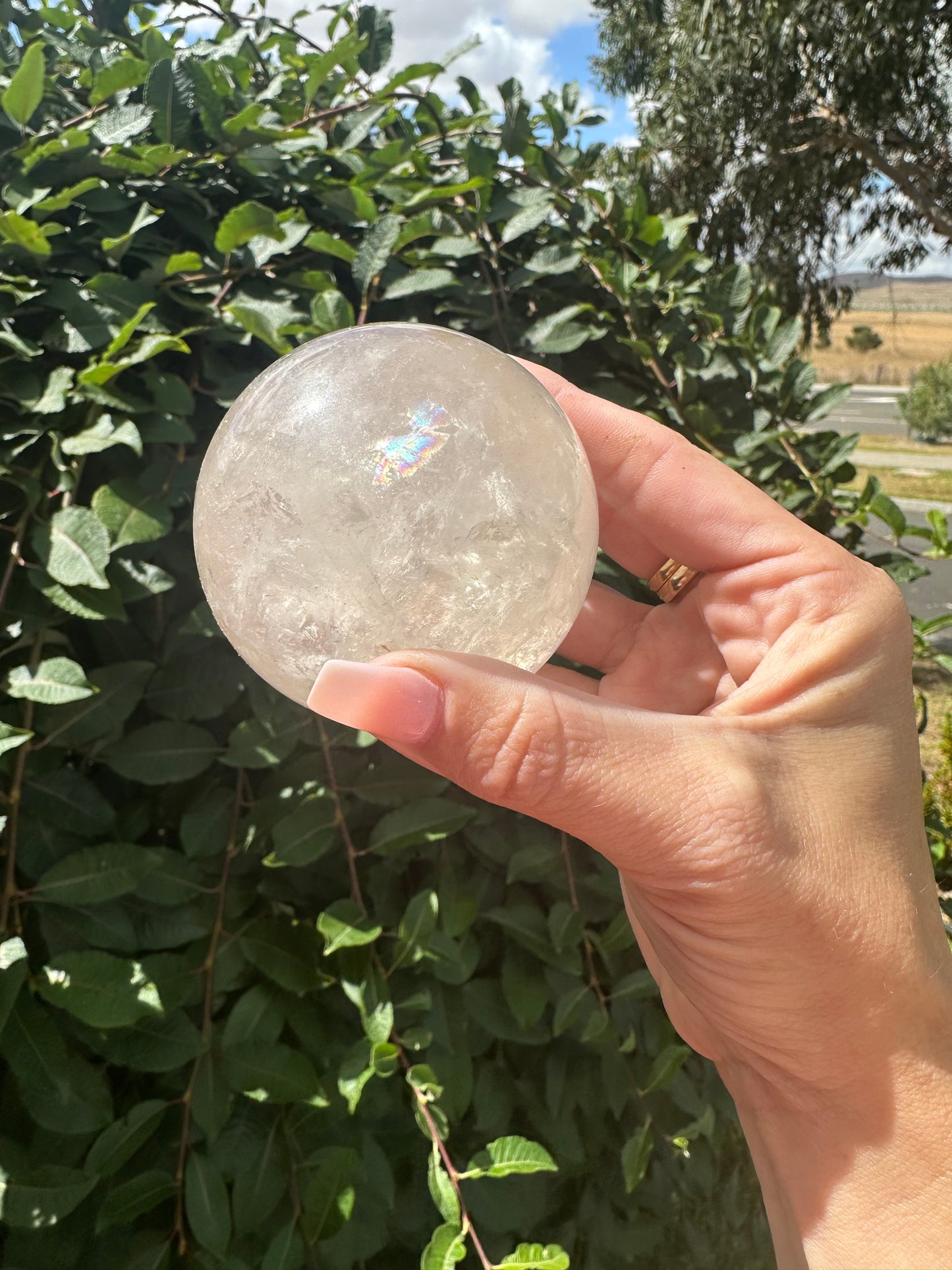 Smokey sphere with rainbow inclusions