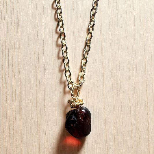 Gold garnet pendant
