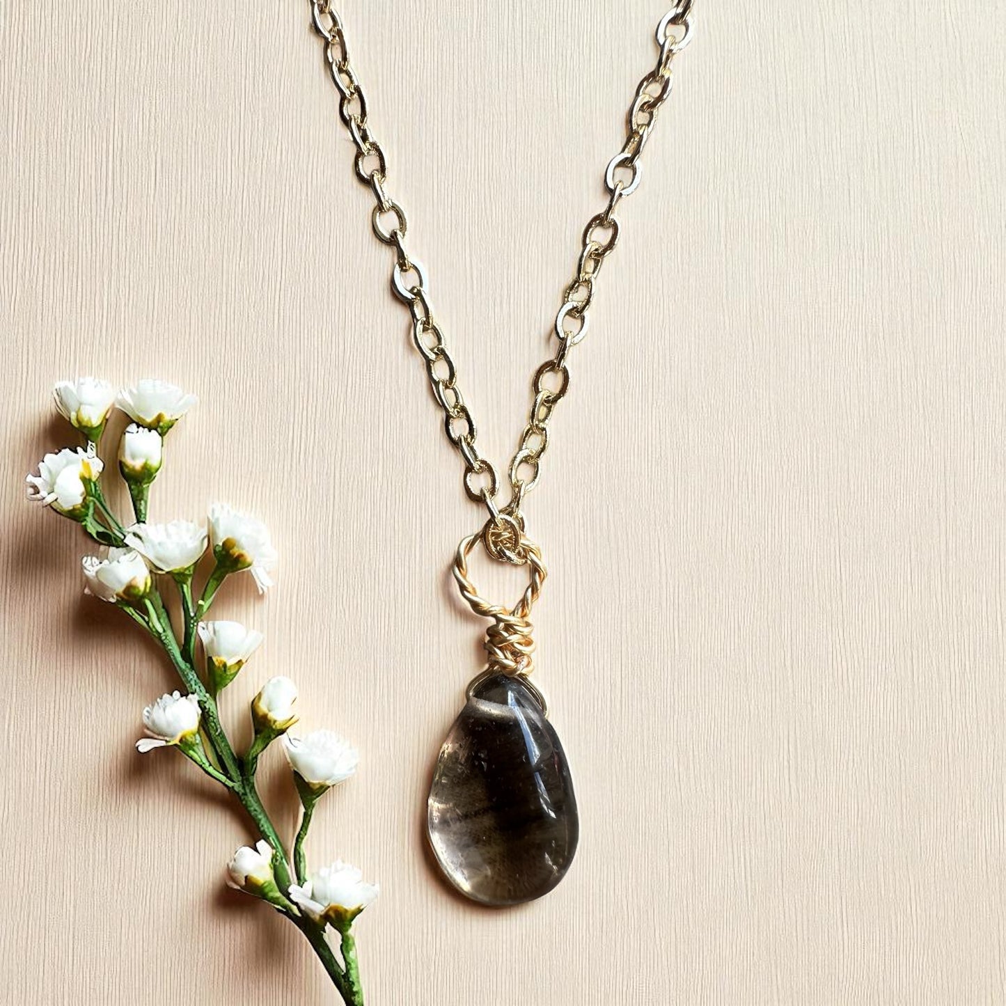 Gold smokey pendant