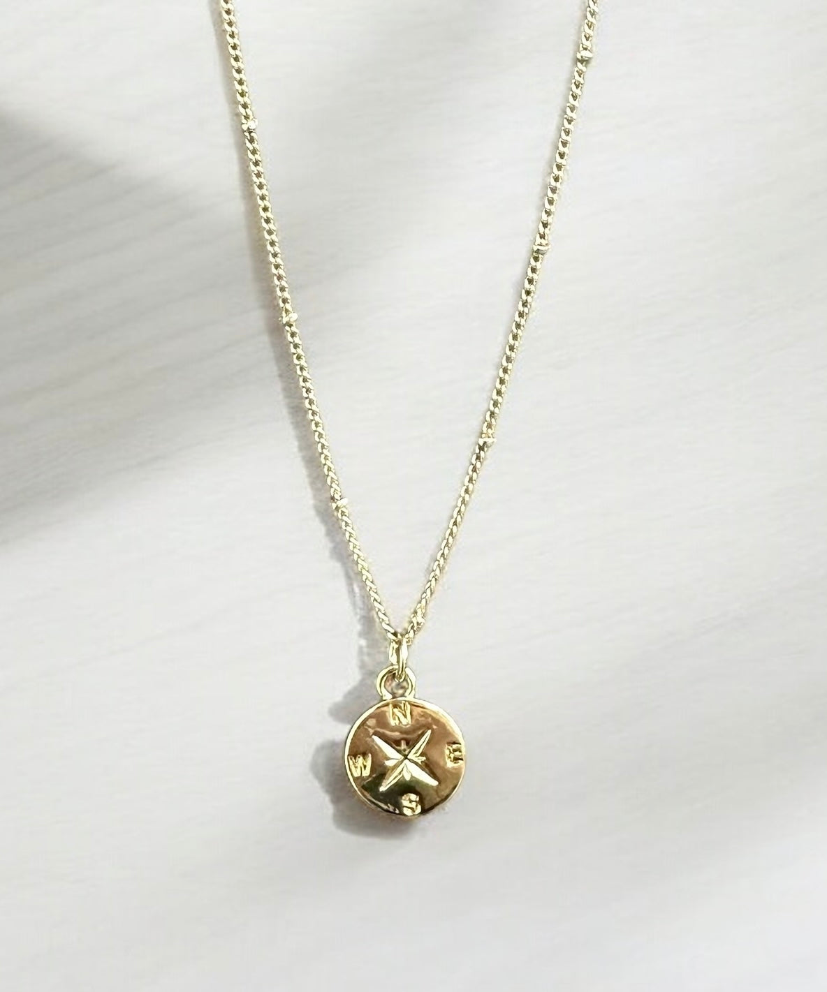 By TBOS  - Gold compass pendant