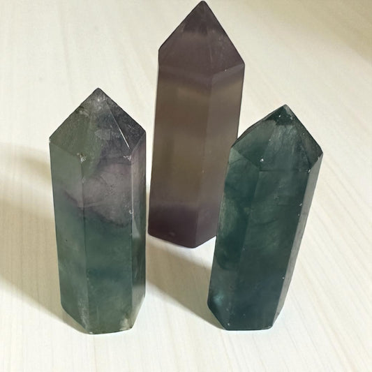 Rainbow fluorite point