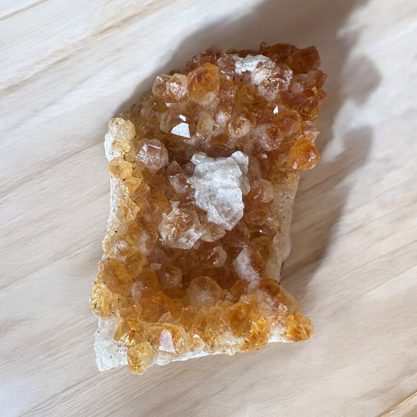 Large citrine cluster with calcite inclusion