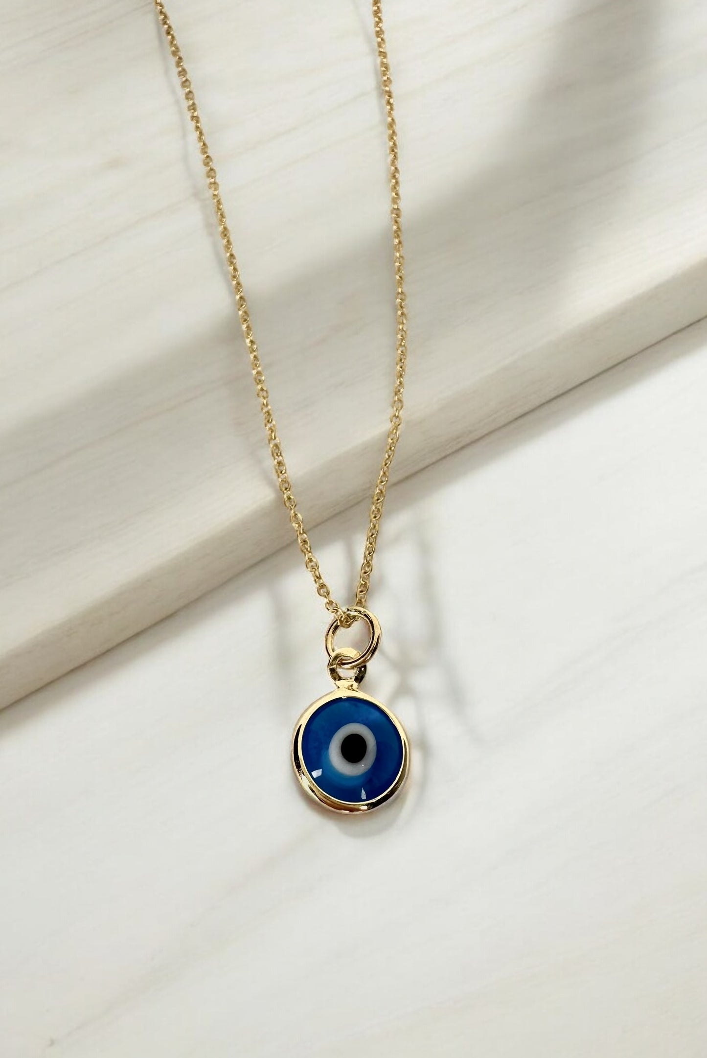 By TBOS  - Gold evil eye pendant