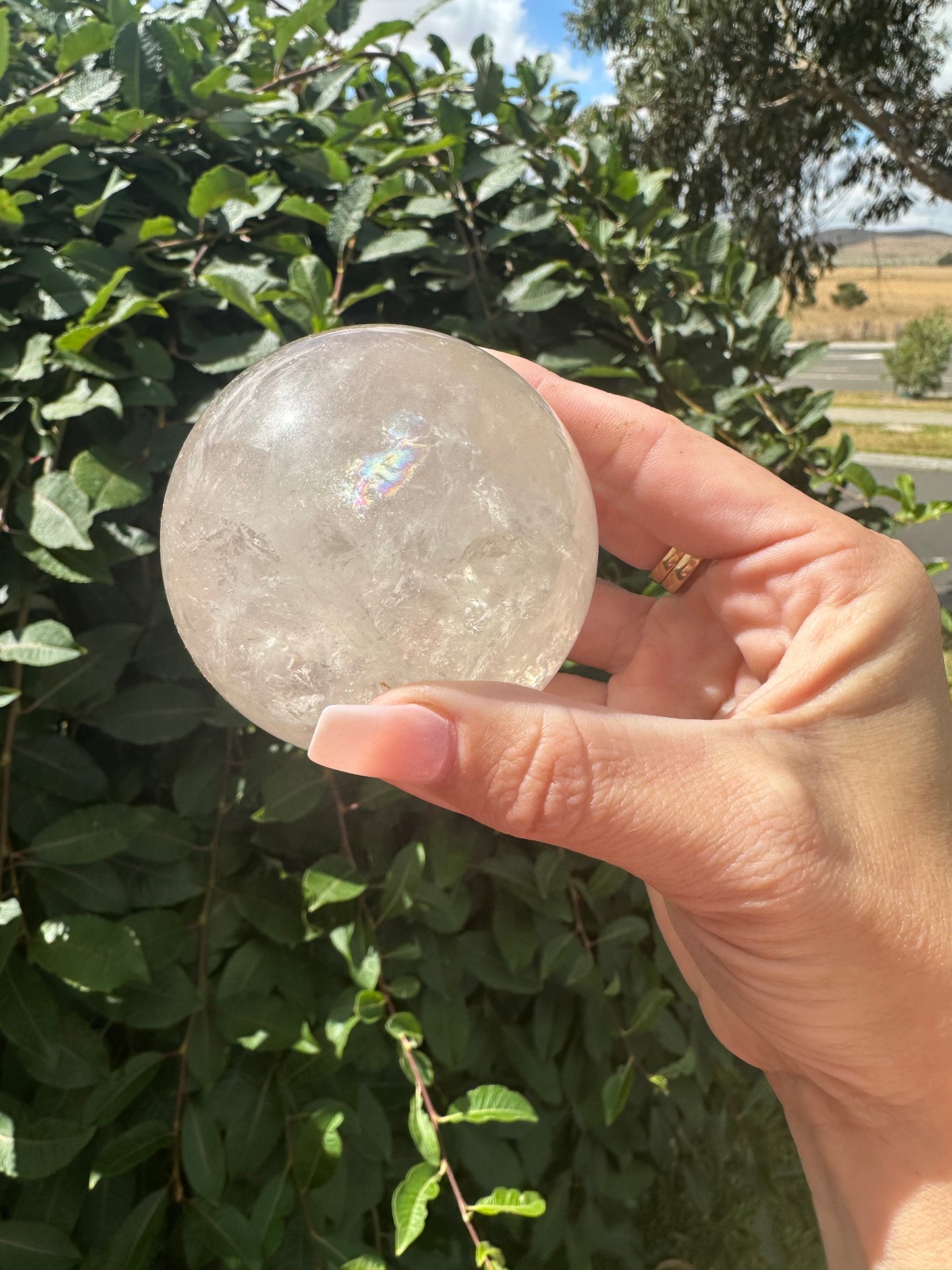 Smokey sphere with rainbow inclusions